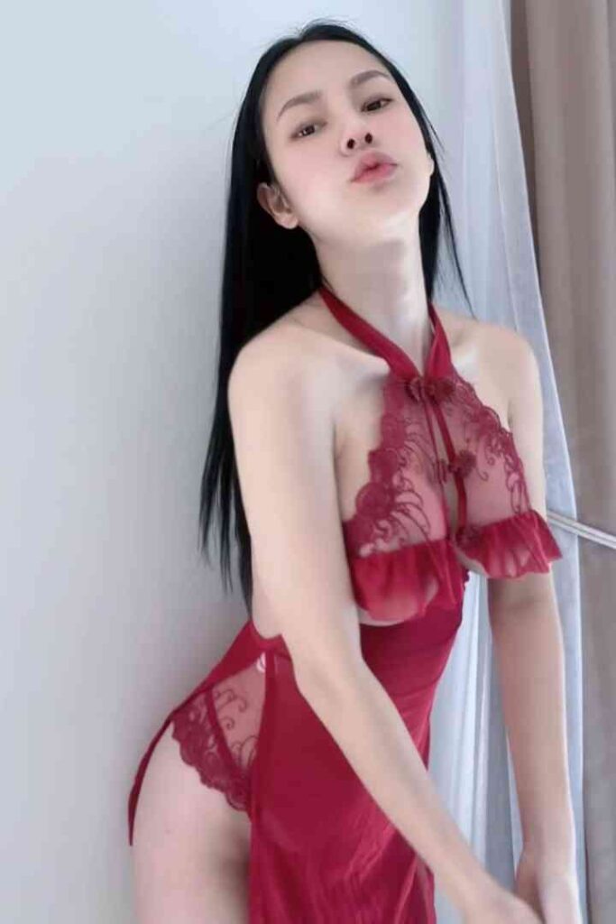 Woman in red lace lingerie
